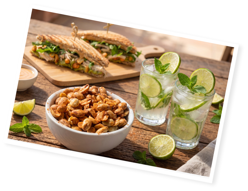 Bol de cacahuètes grillées Menguy's pour l'Apéro avec cocktails citron vert