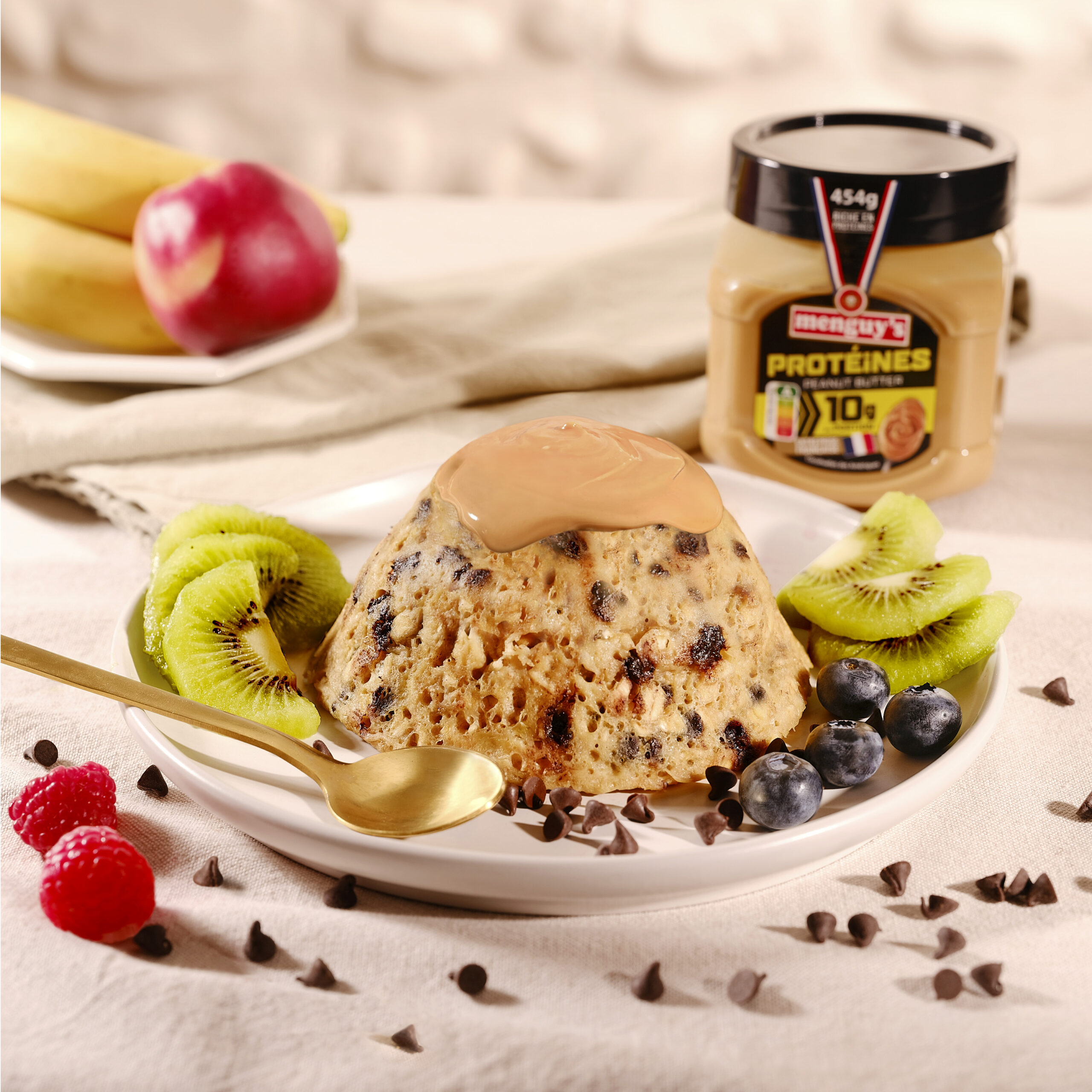 Mugcake aux pépites avec pâte à tartiner protéinée Menguy's et kiwis